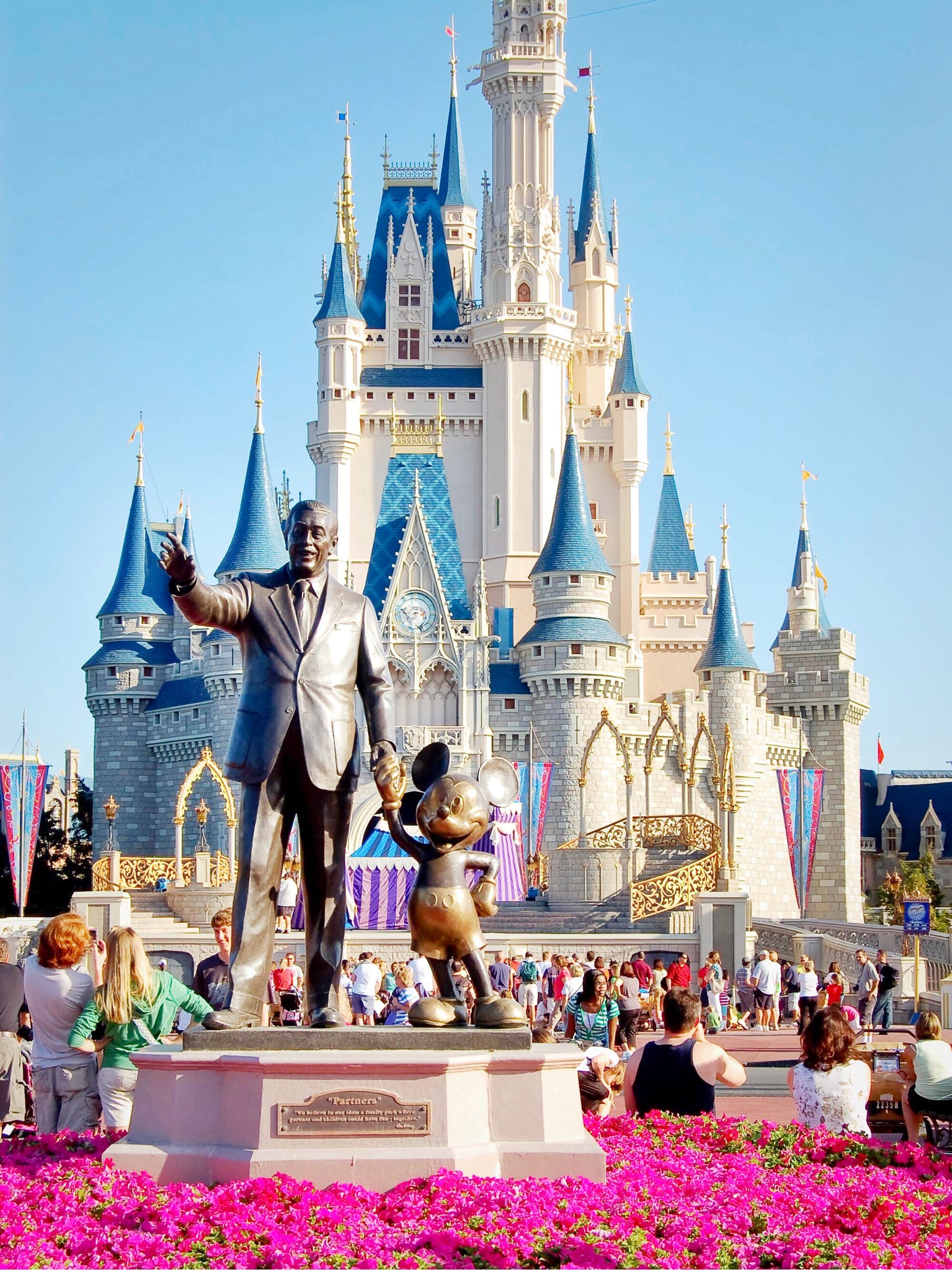 Family enjoying a Walt Disney World vacation at a storybook castle