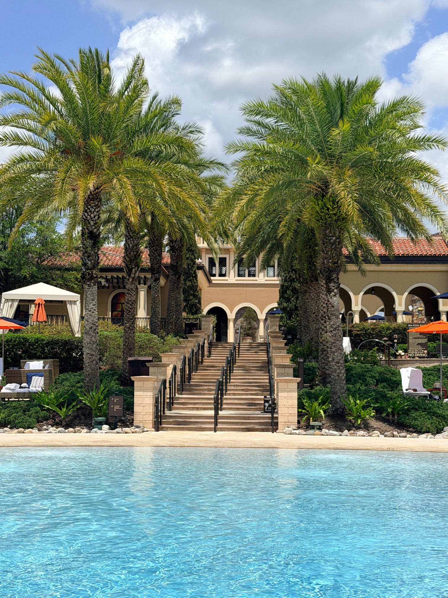 Family relaxing together at a beautiful vacation resort