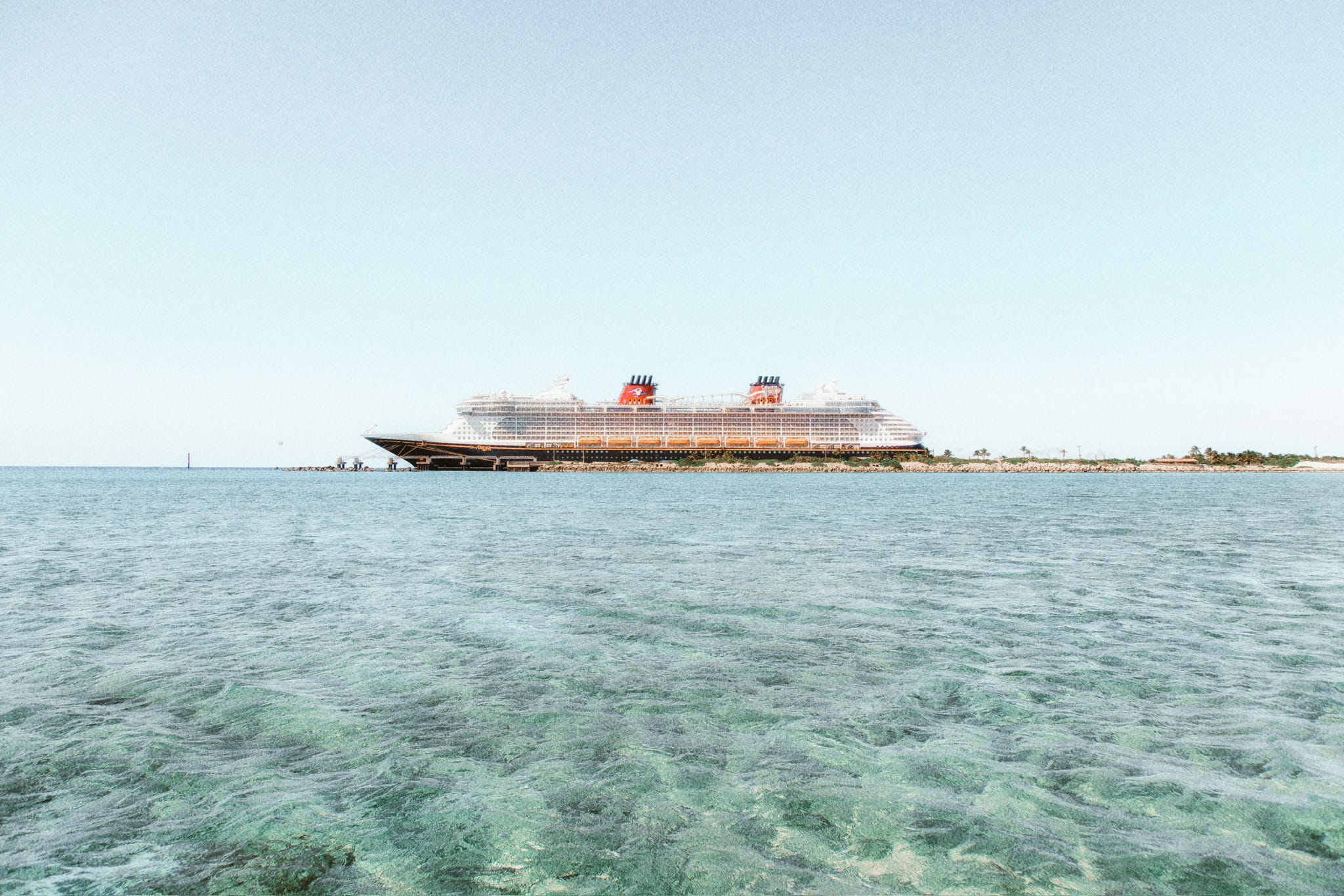 Family cruise ship sailing at sea